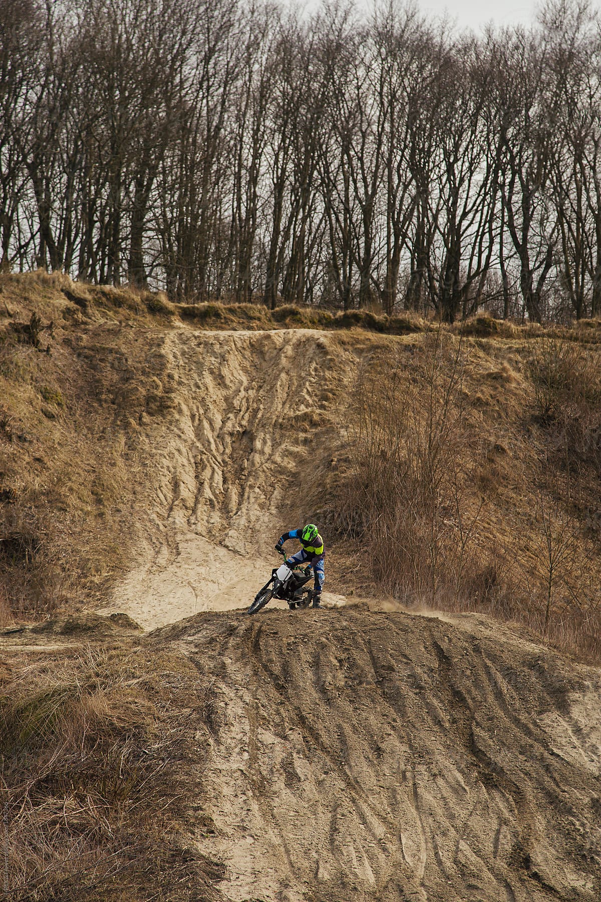 An extreme biker on a hill