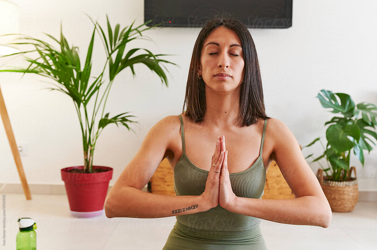 Woman vlogging her yoga meditation