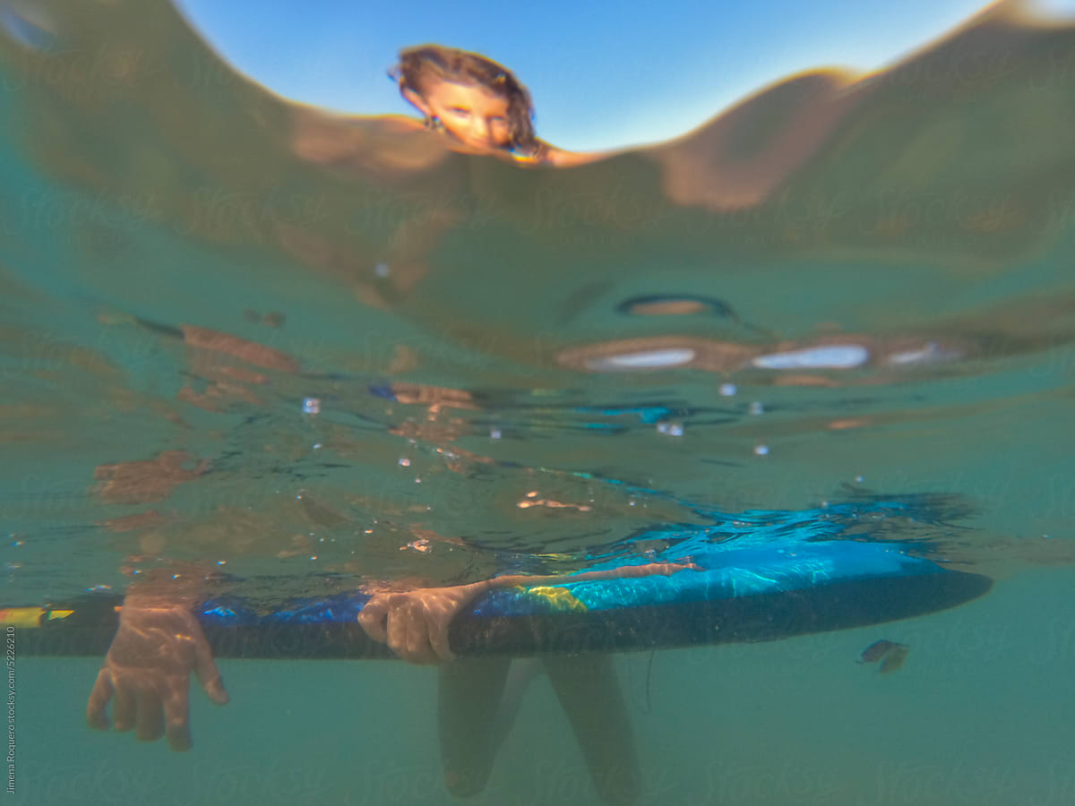 UGC underwater blurry shot of Kid on bodyboard
