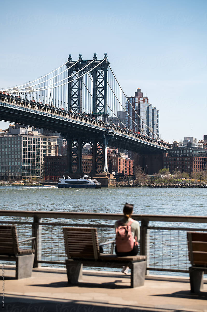 Woman overlooking Manhattan Bridge