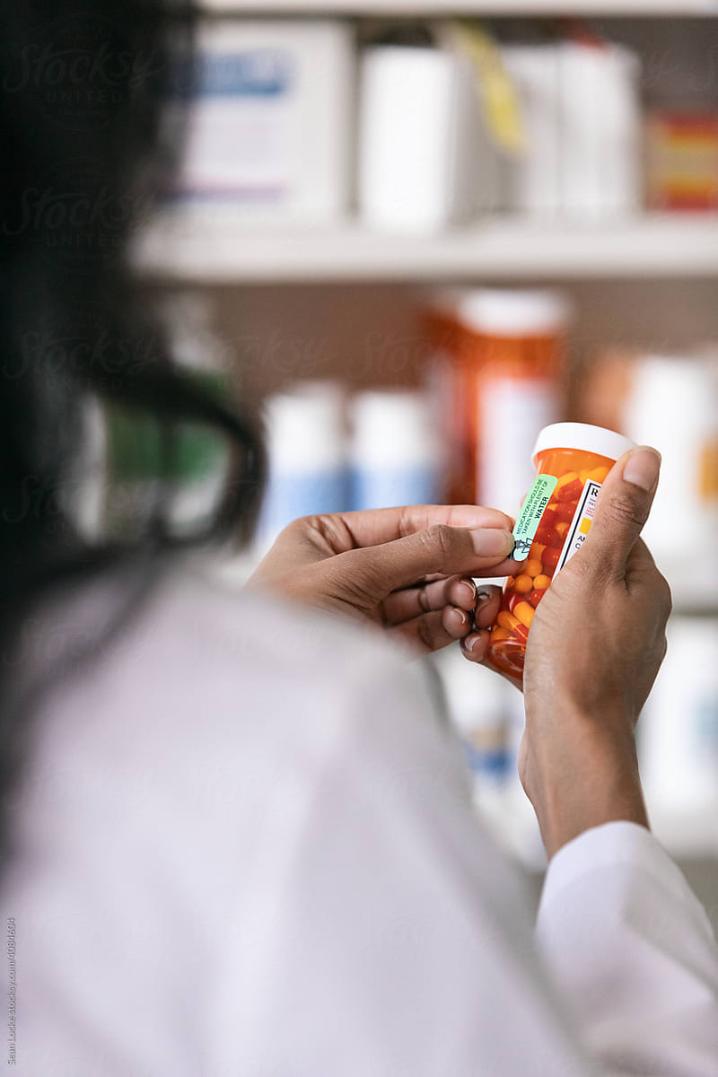 RX: Pharmacist Applies Warning Label