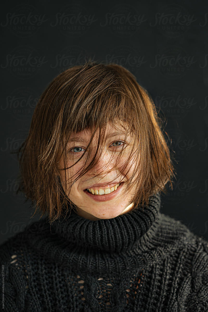 portrait of a smiling charming brunette
