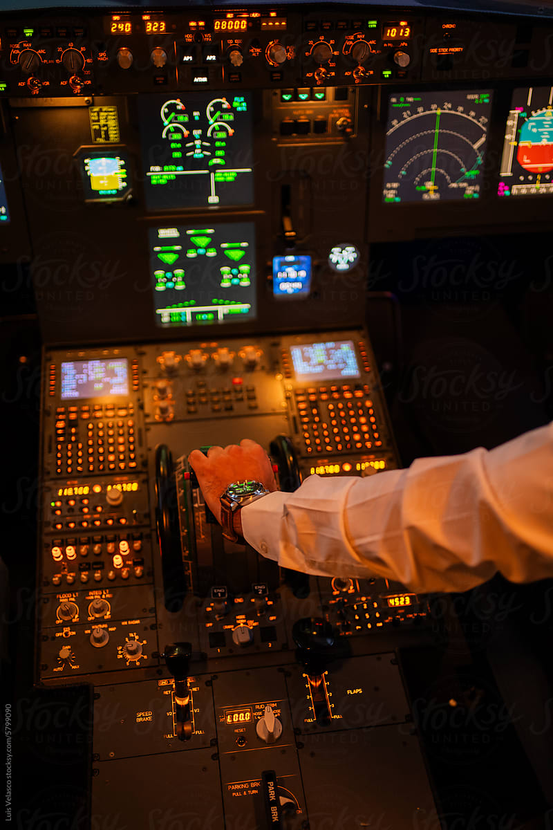 Hand Using An Aircraft Cabin, Flight Academy Simulator.