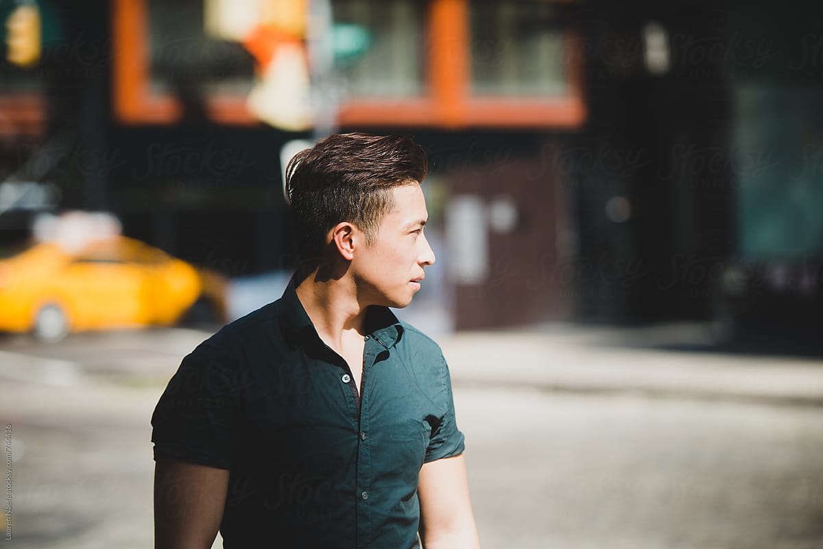 Young man standing in the street in New York City