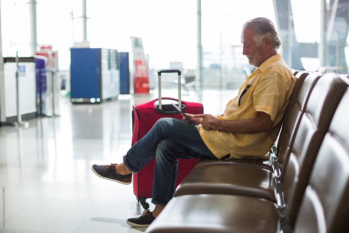 Man Waiting at the Airport Gate