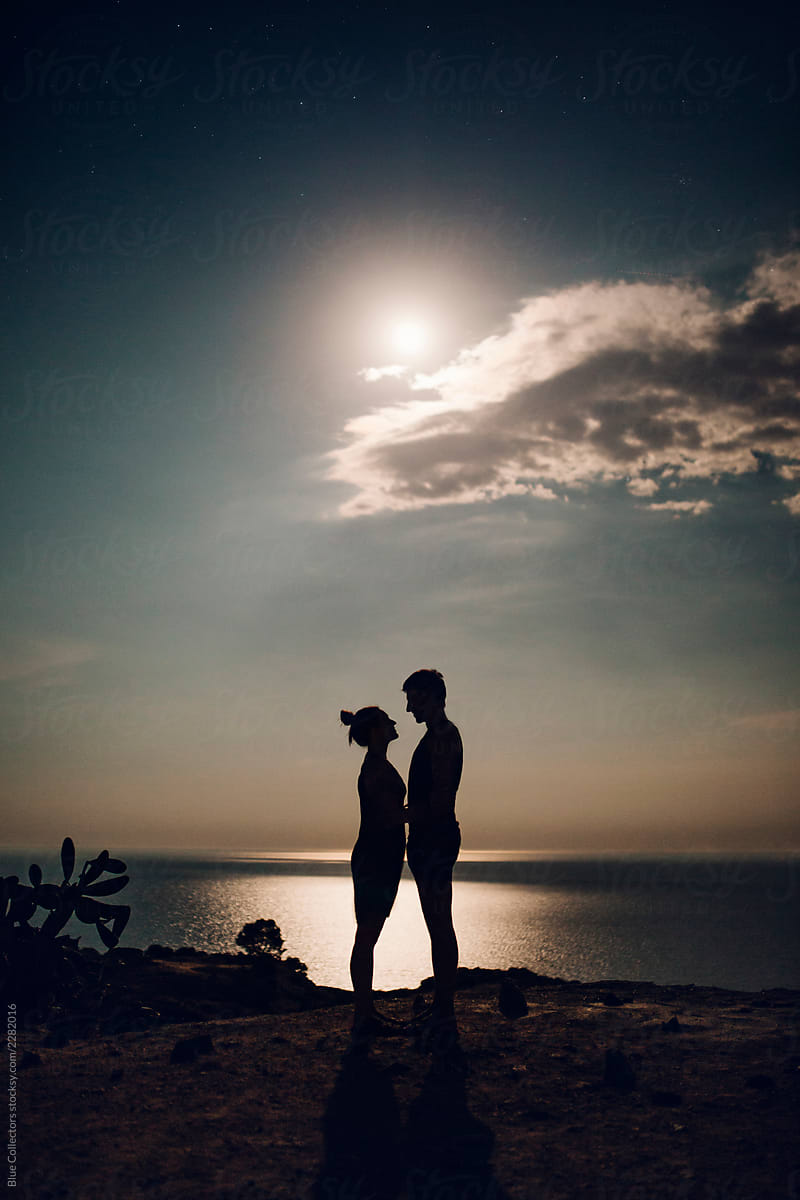 Couple in love standing in the sea