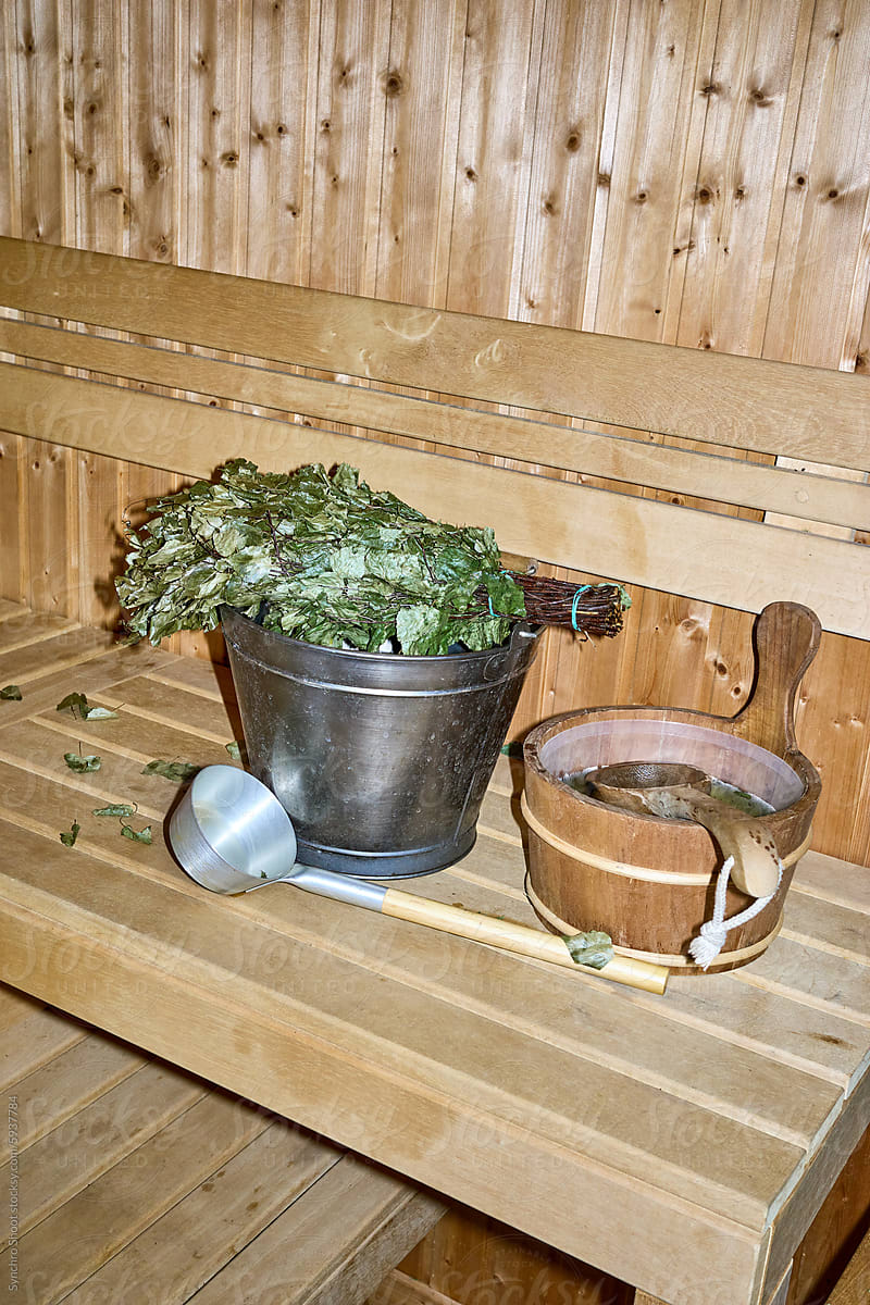 Traditional sauna accessories on wooden bench