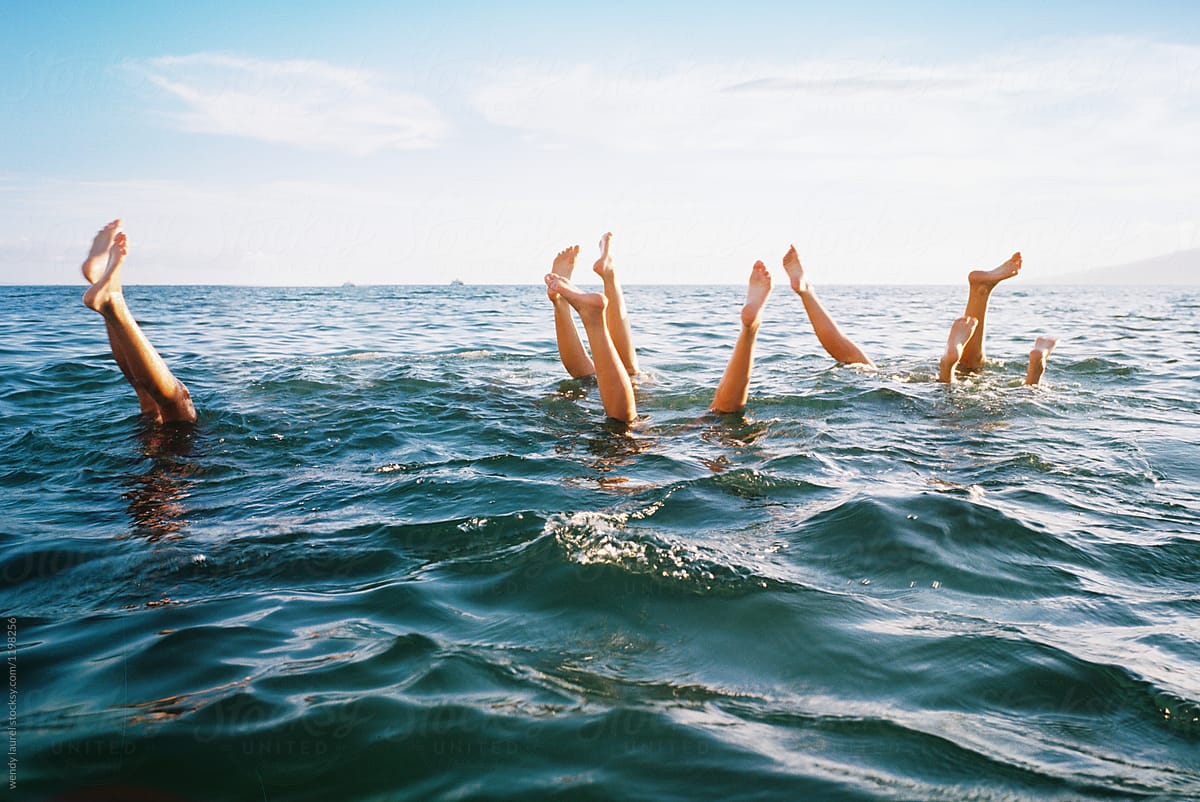 Multiple Handstands In Ocean Water By Stocksy Contributor Wendy Laurel Stocksy