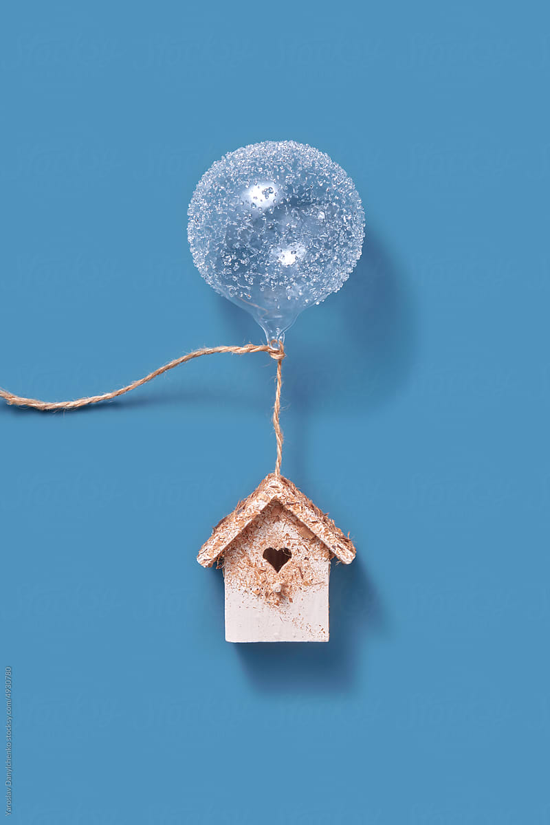 House with glass sphere New Year ornaments.
