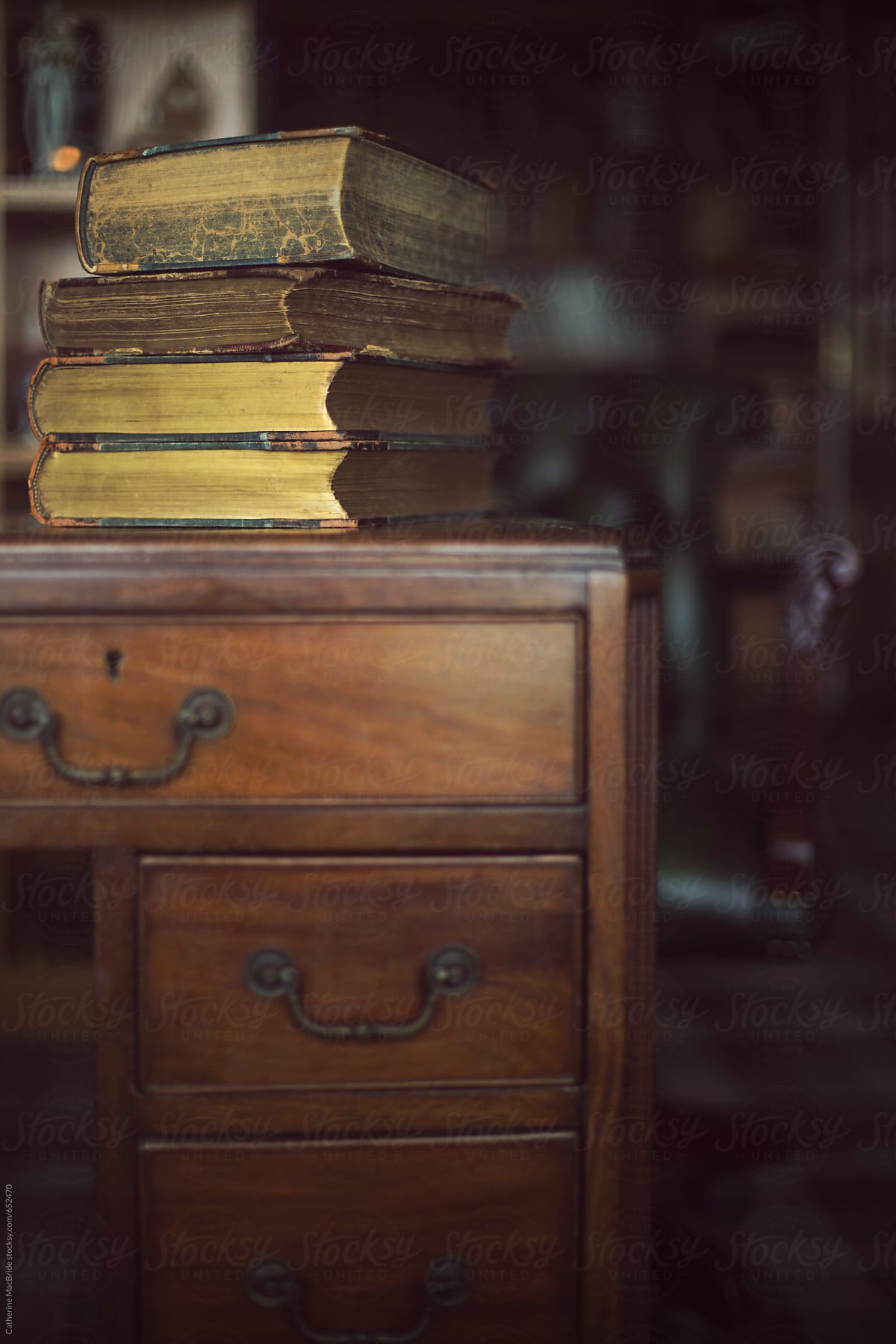 Old books on a reading desk...