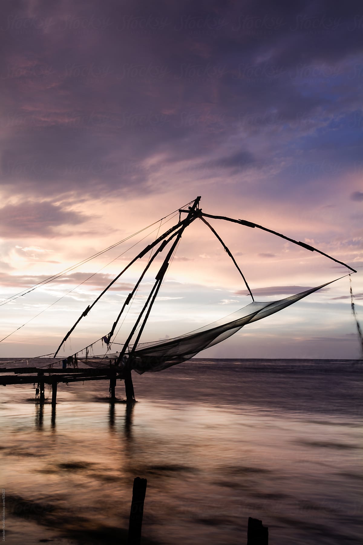 Chinese Fishing Net At Sunset by Stocksy Contributor Akela - From Alp To  Alp - Stocksy