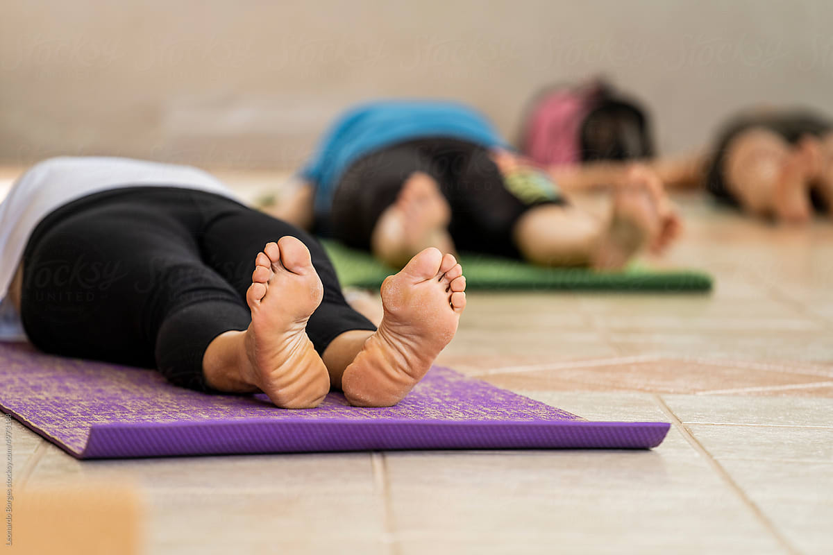 Relaxed yoga students and relaxing therapy