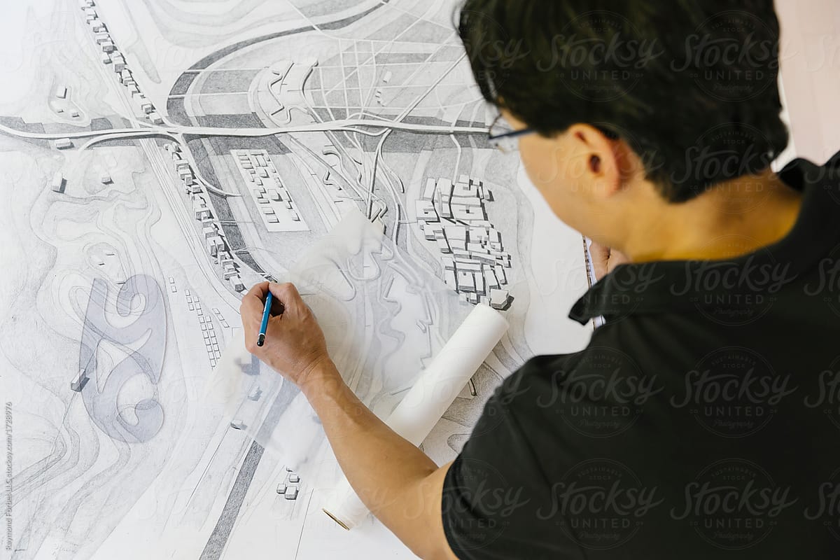 Architect working on Drawings in Office