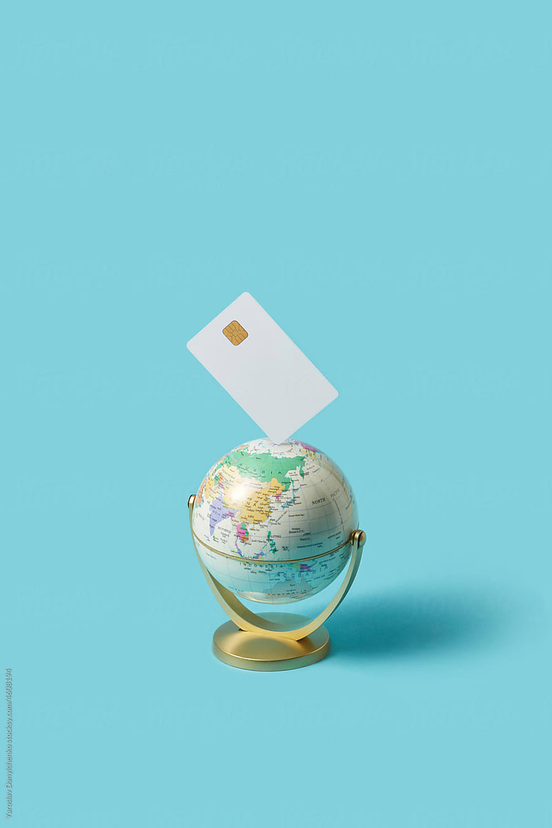 Credit card on the globe