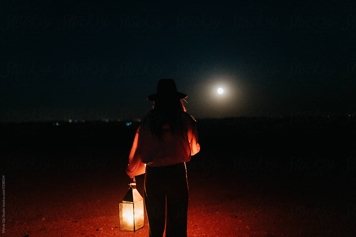 Woman exploring at night
