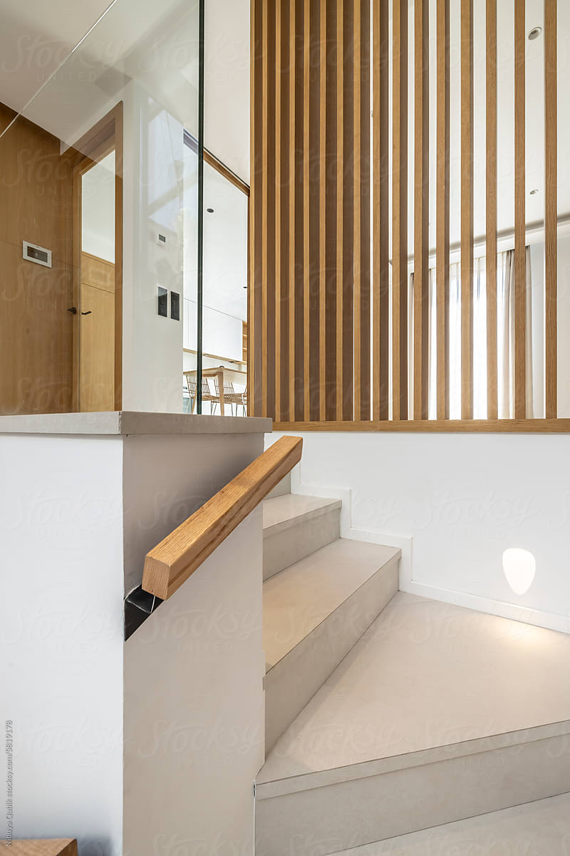 A close-up of the stairs in a modern house