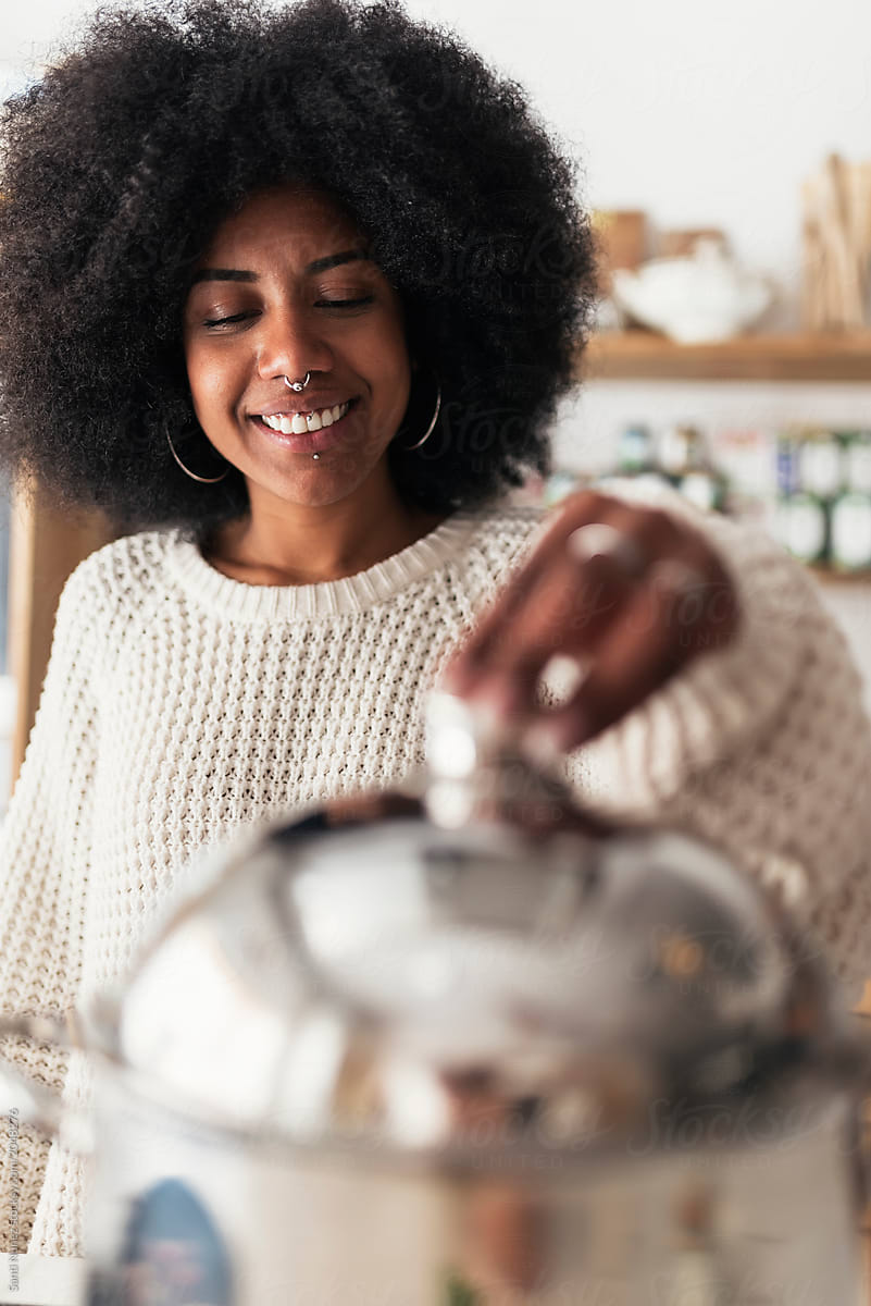 Beautiful Black Woman Cooking In Her Home Del Colaborador De Stocksy Santi Nuñez Stocksy 