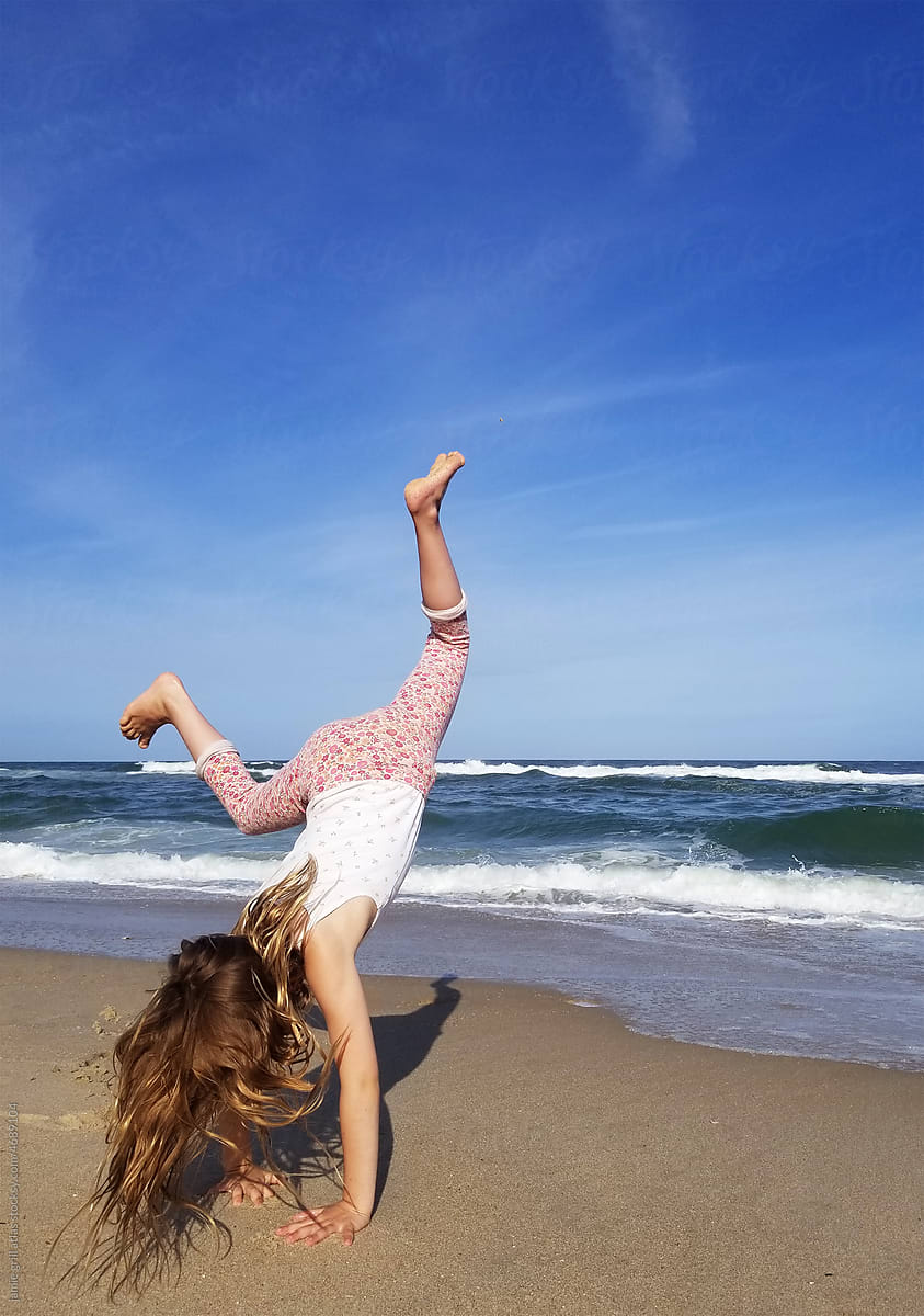 Mobile Image of a Cartwheel by the Ocean