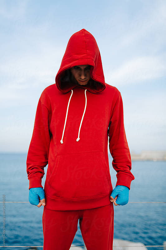 Confident fighter in red sportswear