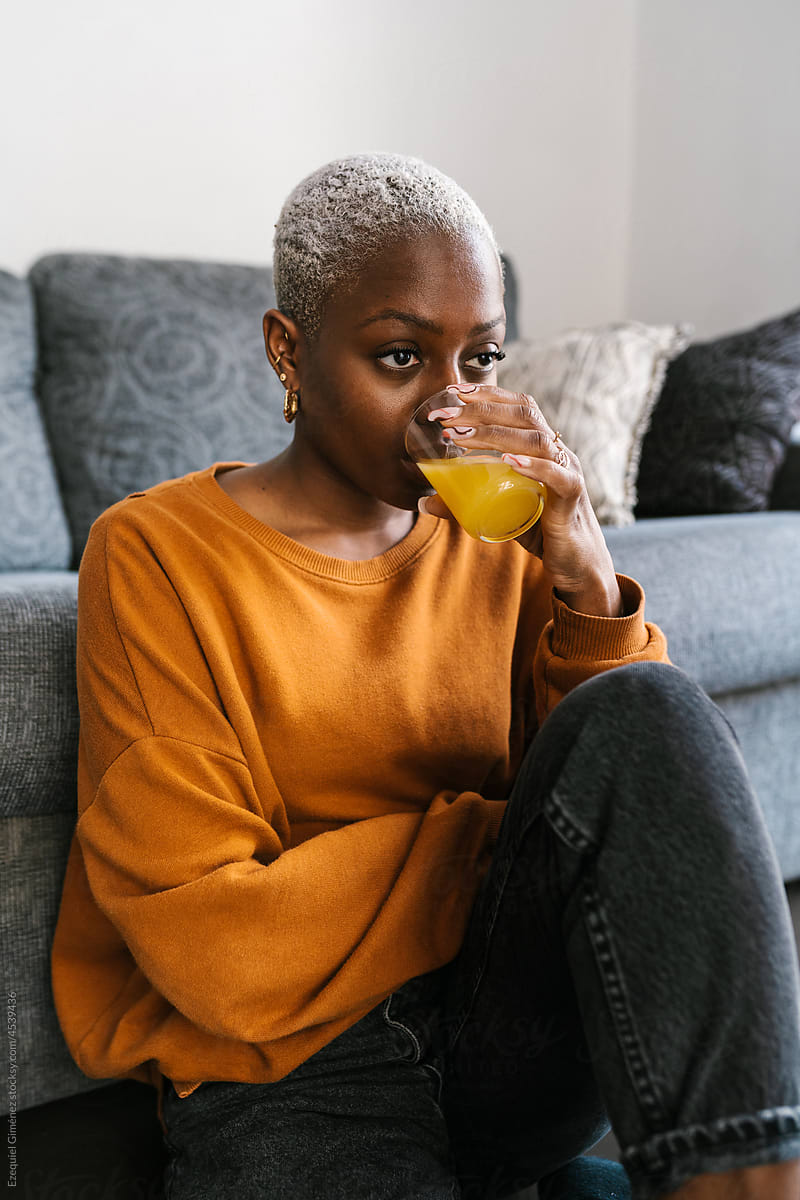 Female drinking orange juice