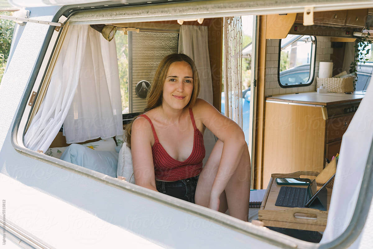 Portrait of a woman in a caravan