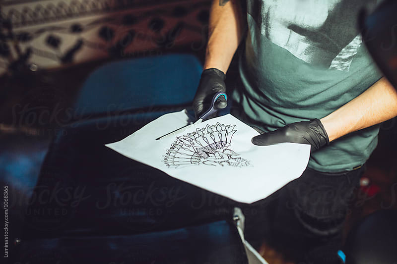 Tattoo Artist Preparing a Draw