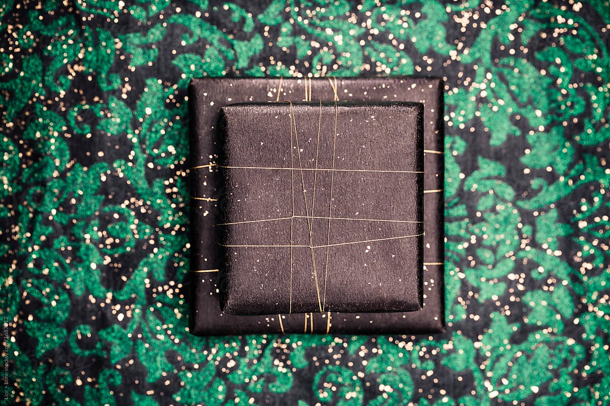 Stacked Gifts In Modern Black And Gold Wrapping Paper by Stocksy  Contributor Lior + Lone - Stocksy