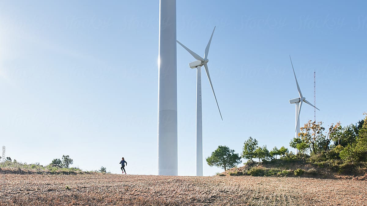 running or jogging on windmill farm