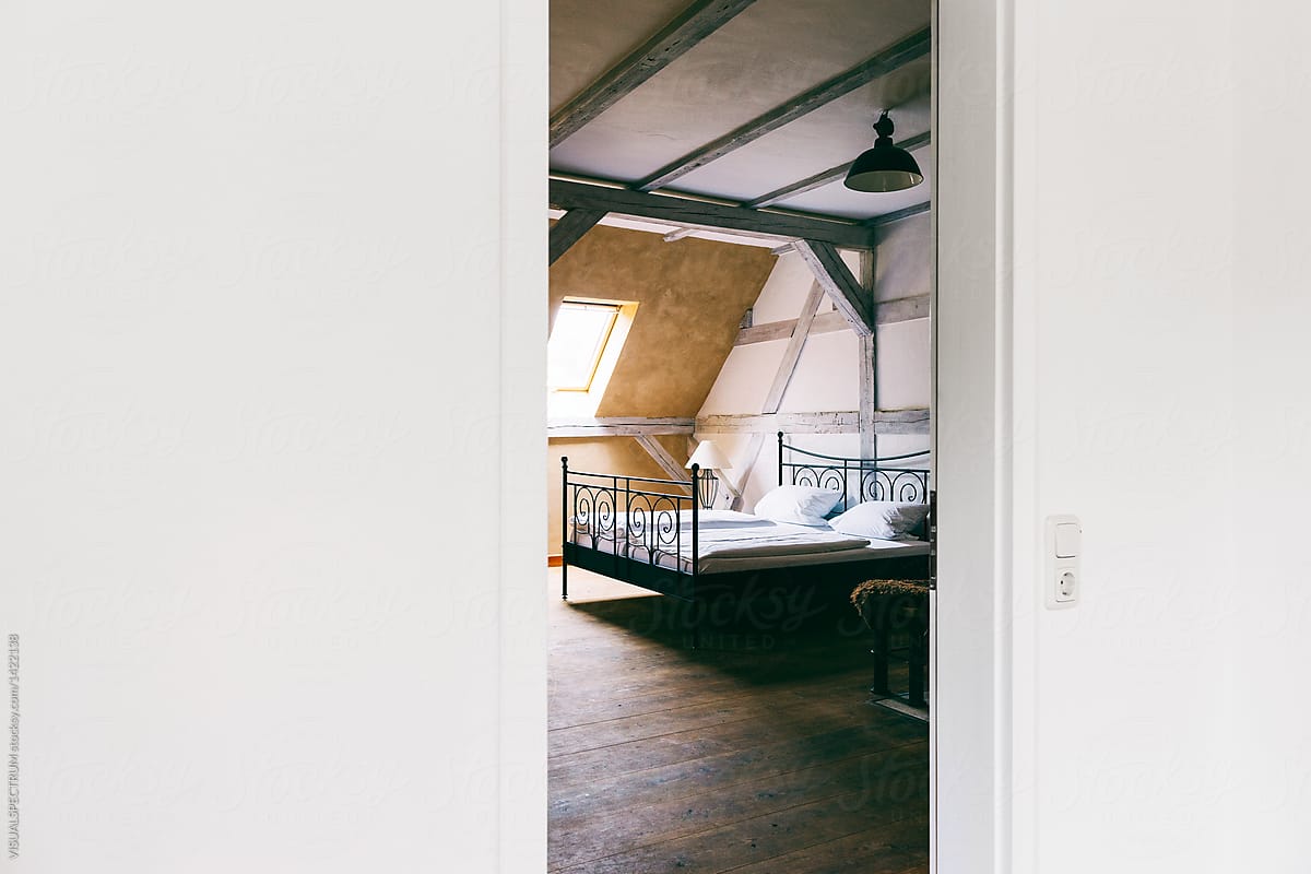 Rustic Bedroom With Old Wooden Floorboards Viewed Through