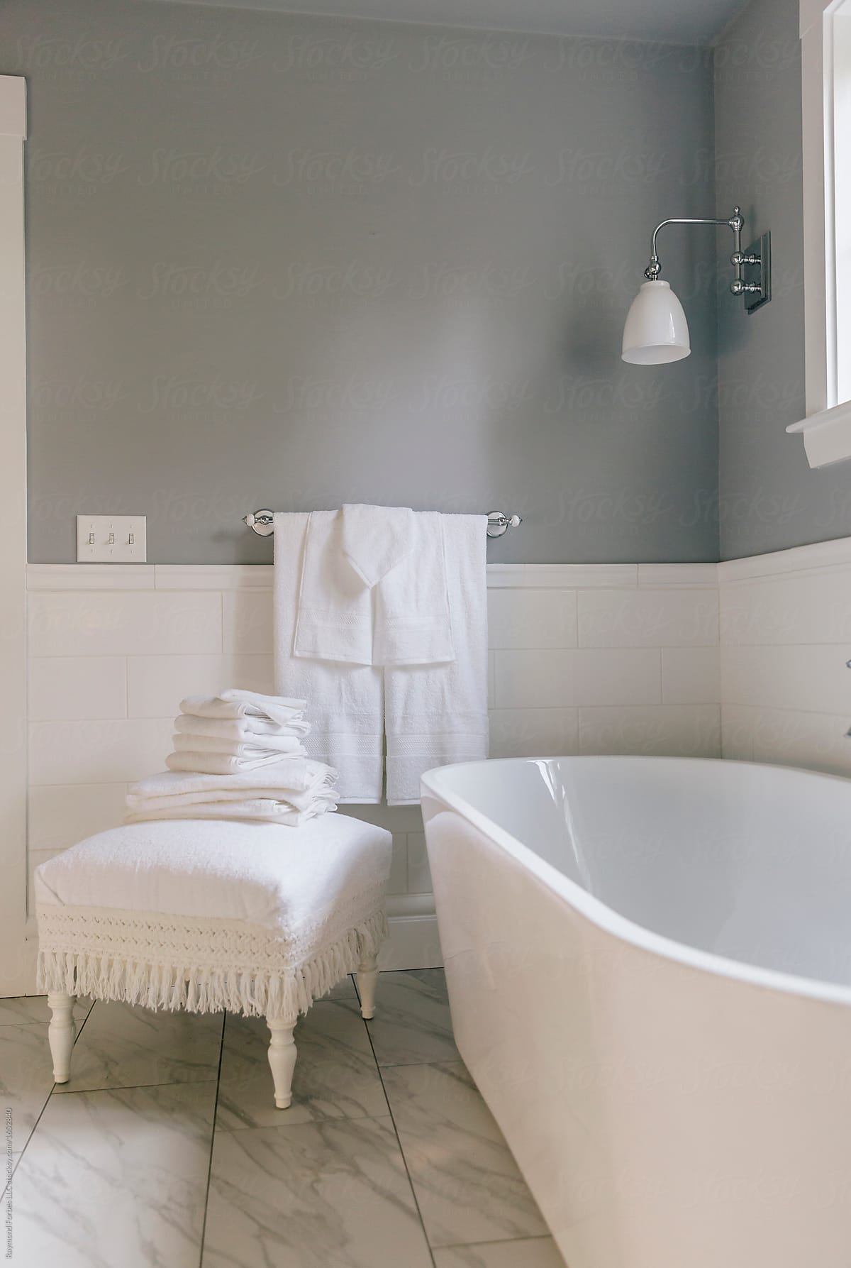 Luxury Bathroom with tub and fresh towels