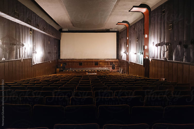 Old Abandoned Movie Theatre With Empty Screen