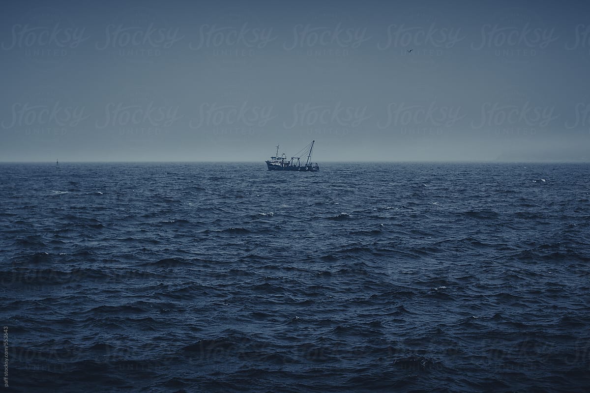Sailing Fishing Boat In The Middle Of The Sea by Paff