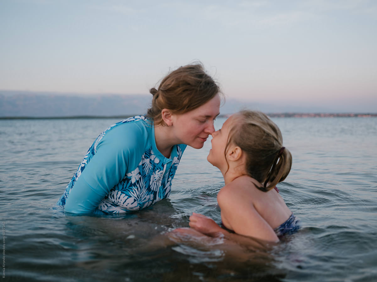 Mother and daughter at the sea