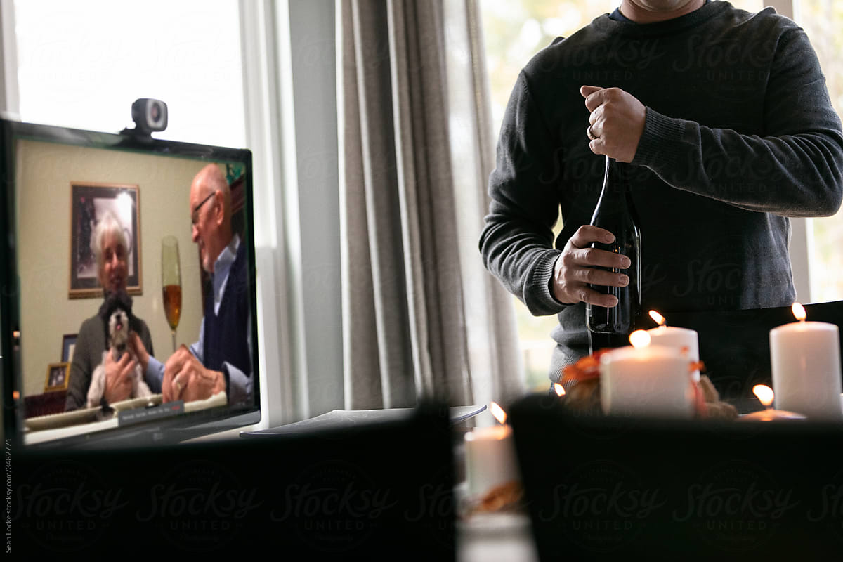 Thanksgiving: Man Opens Wine Bottle With Family On Video Chat