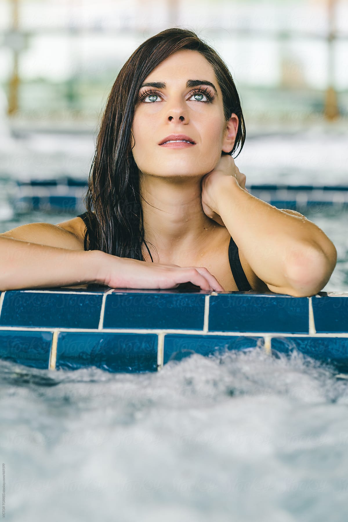 Beautiful Woman Relaxing In A Spa Center By Stocksy Contributor Victor Torres Stocksy