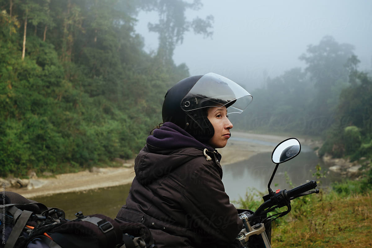 Woman travel by her motorcycle