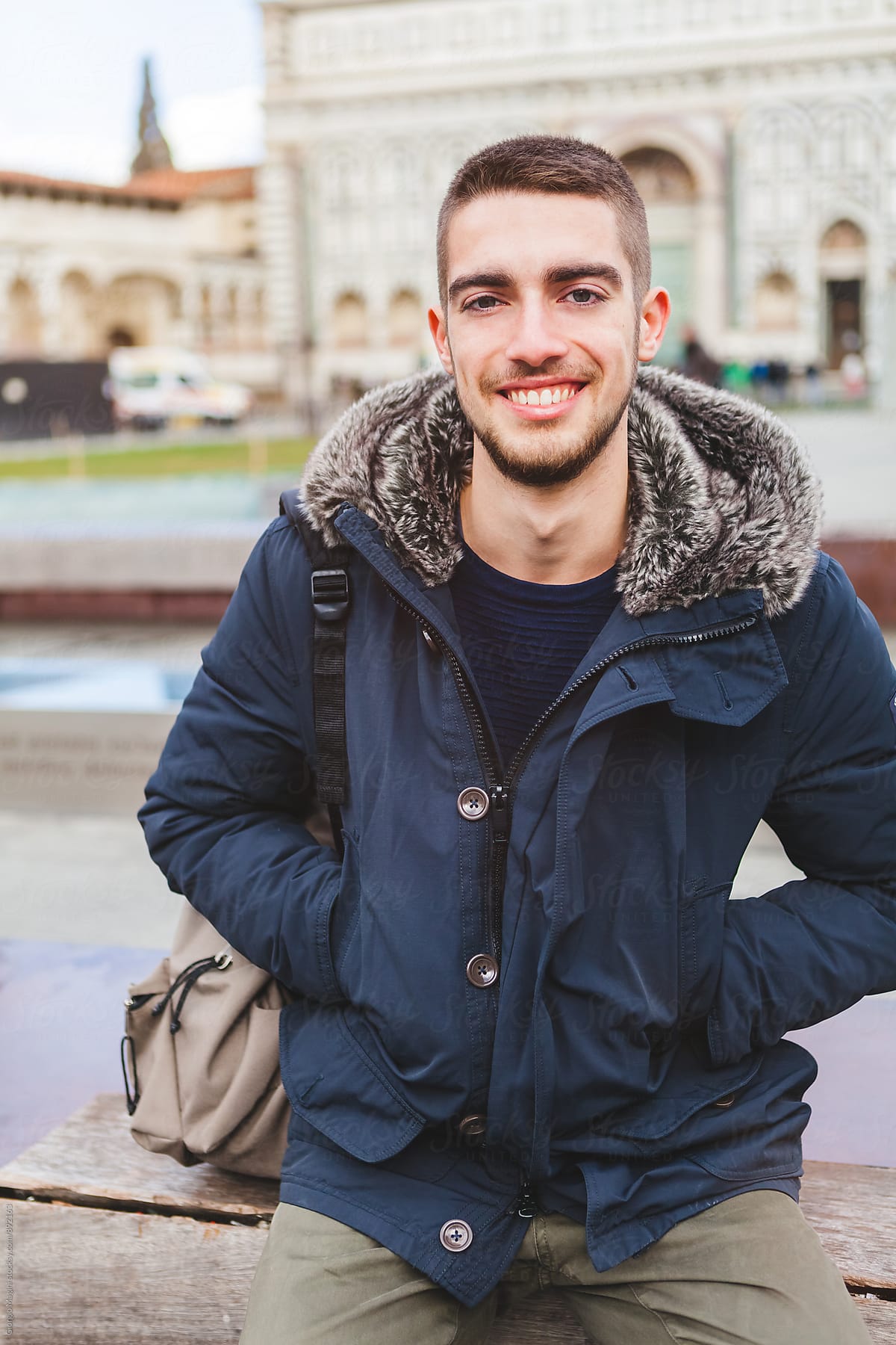 Young Man in Italian City during the Cold Season