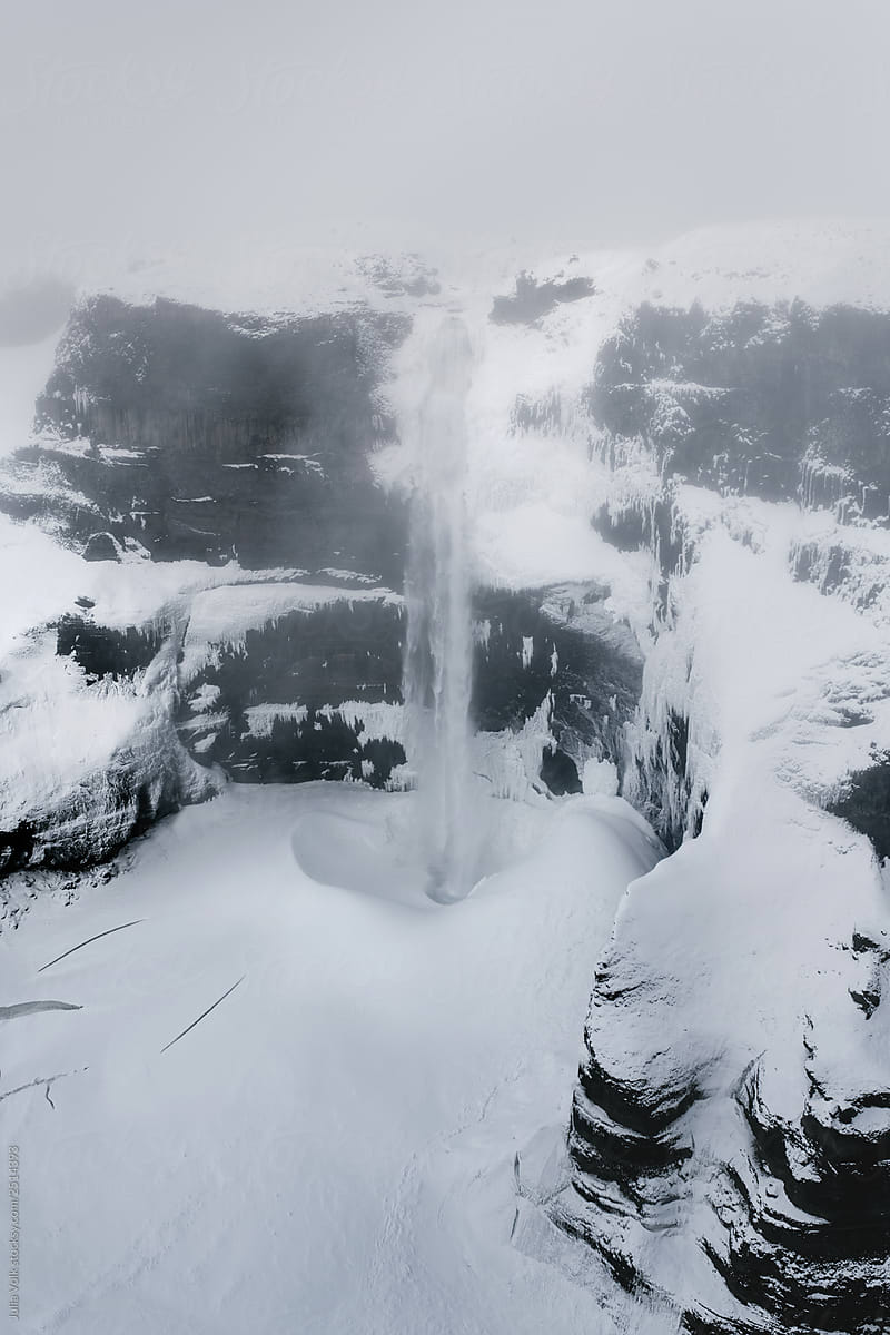 Frozen Waterfall In Iceland