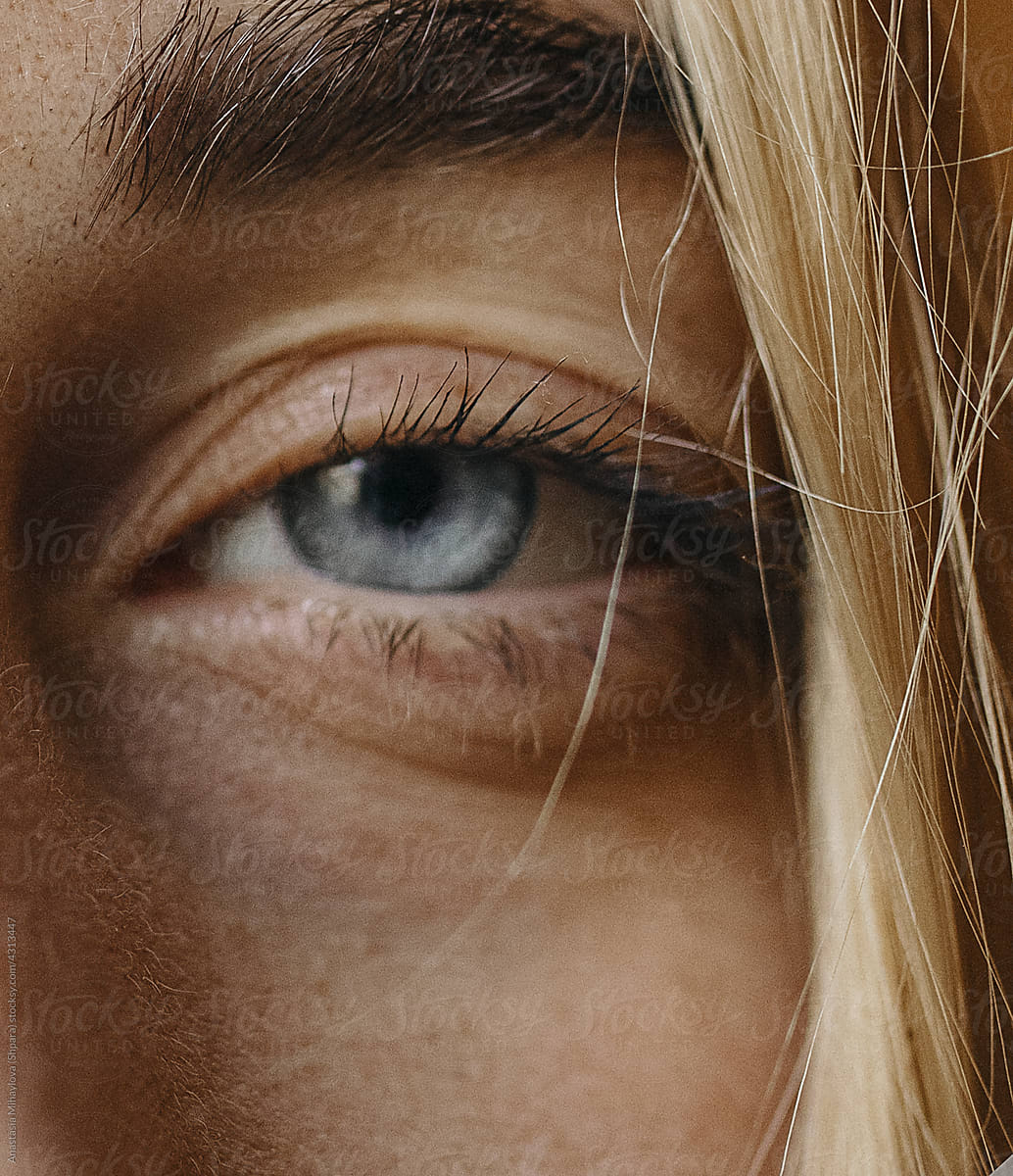 Detail - Close Up Of A Human blue Eye