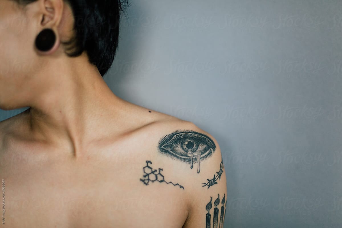 Crying Tattoo On The Man Shoulder" by Stocksy Contributor "Nabi Tang" - Stocksy