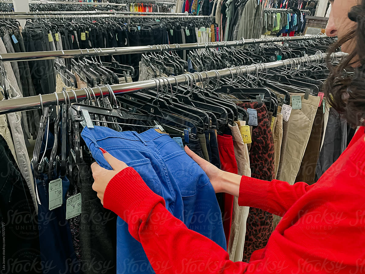 young woman at thrift store