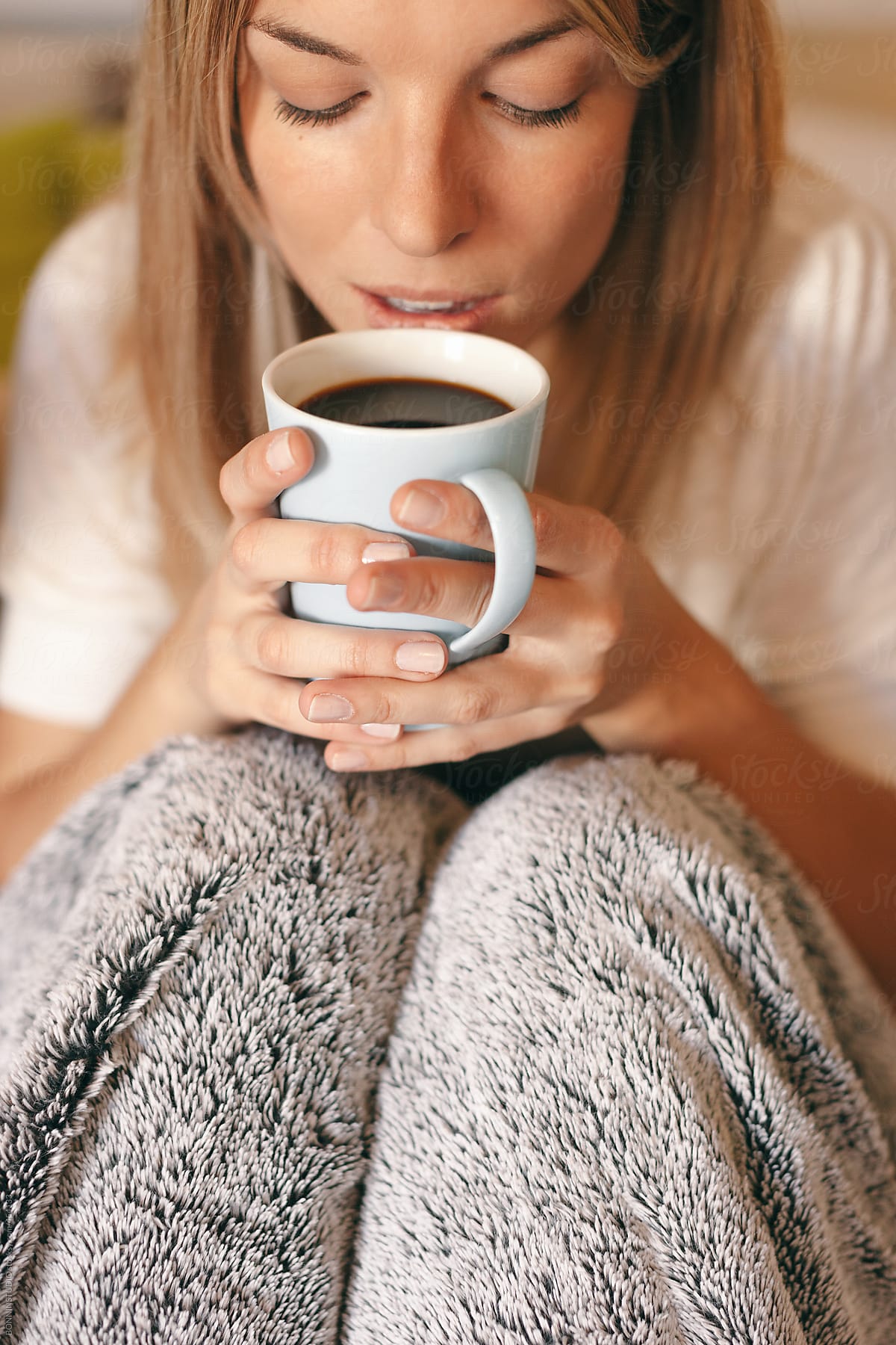 Beautiful Young Woman Drinking Coffee On The Morning At Home By Stocksy Contributor