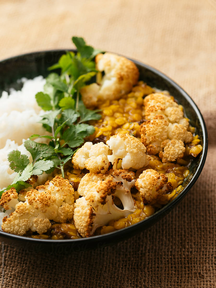 Roasted cauliflower with curried Lentils and Rice