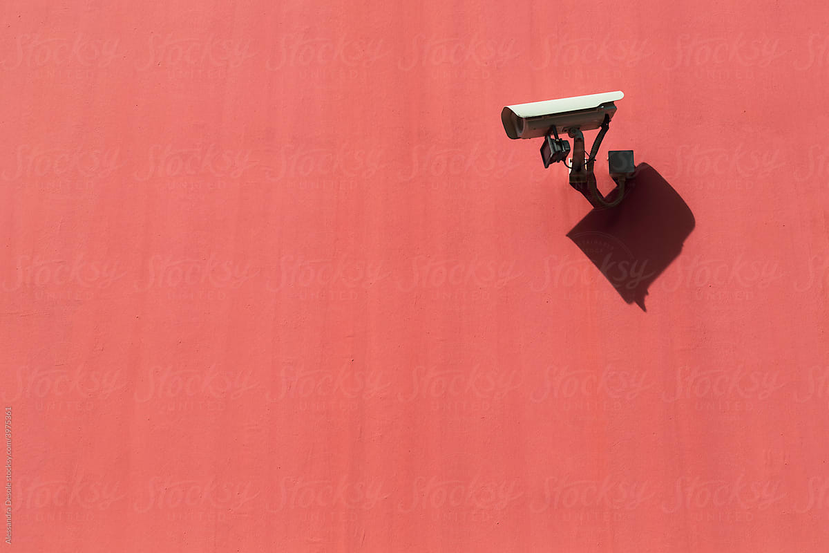 security cameras on the wall guarding the street