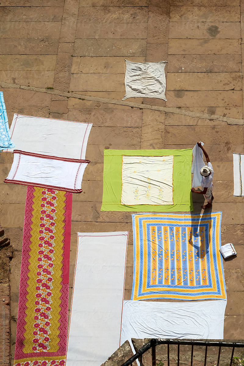 Sheets and sari\'s being dried in the sun in Varanasi, India