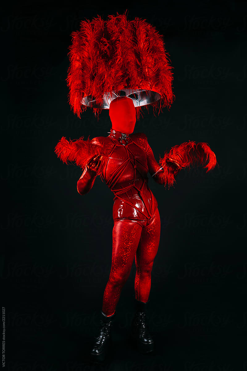 Man performing with awesome and strange red uniform