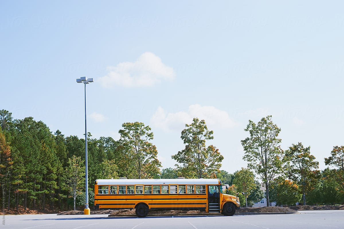 American School Bus waiting in a parking lot