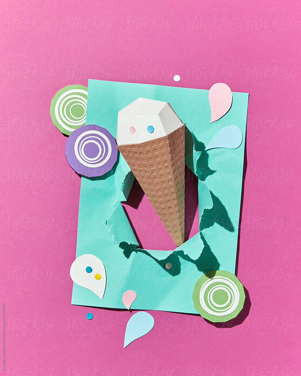 Flat lay paper origami waffle cone on a duotone background with