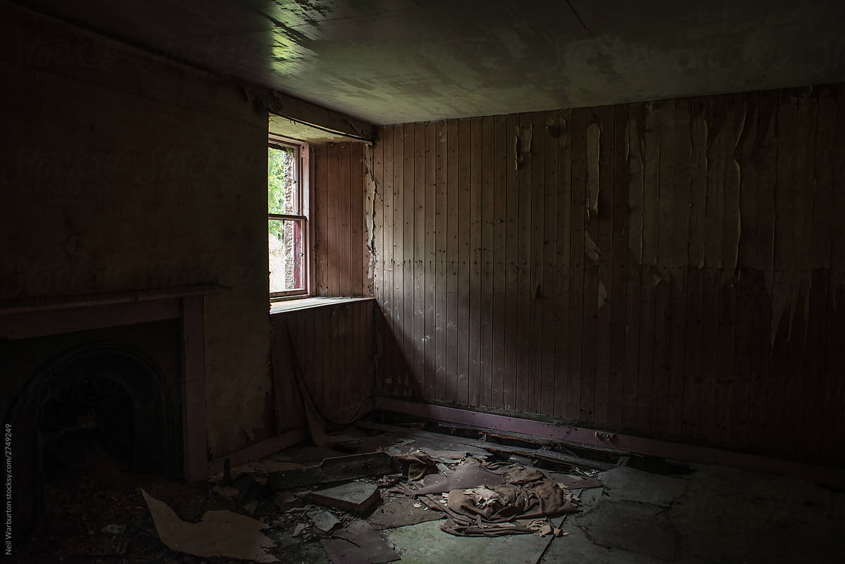 Light through window of abandoned house