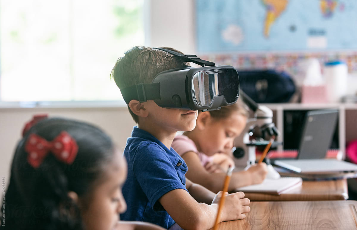 School: Boy Uses VR Headset In Classroom